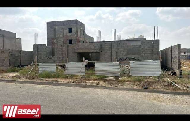 A building in Sabya Azm for sale Nakhlan Sabya