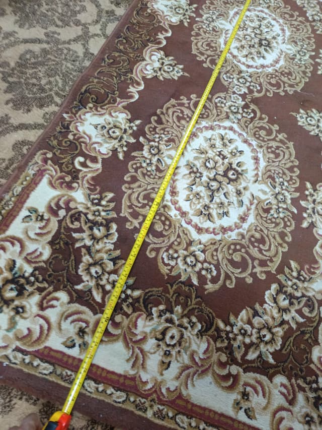 One by two meter clean carpet for sale in Riyadh