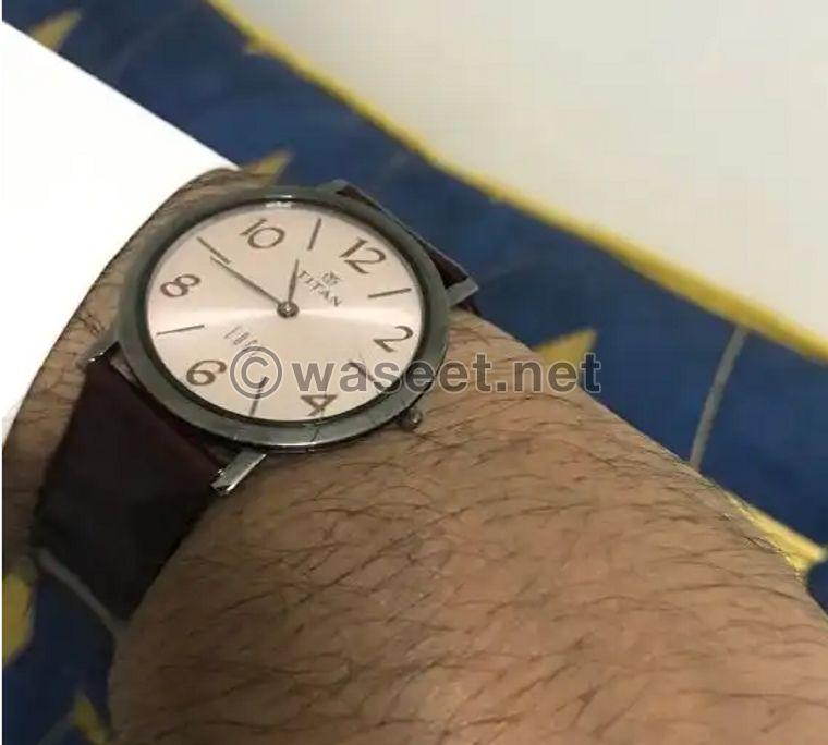 ساعة تيتان اصلية  للبيع 0