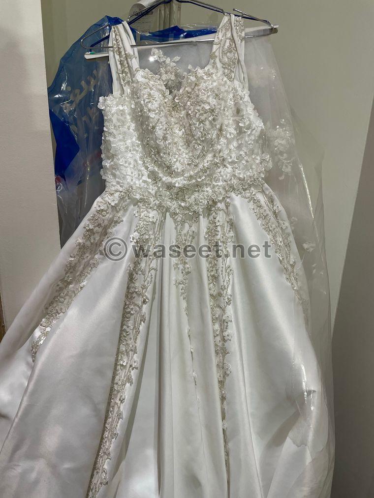 فستان زفاف ابيض جميل وانيق جداً  3