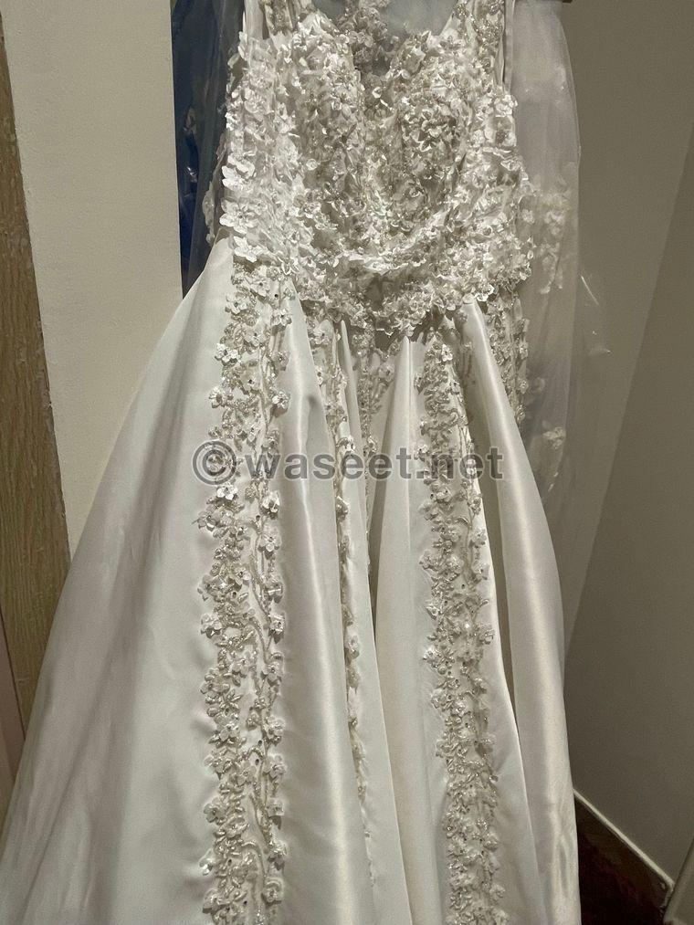 فستان زفاف ابيض جميل وانيق جداً  7
